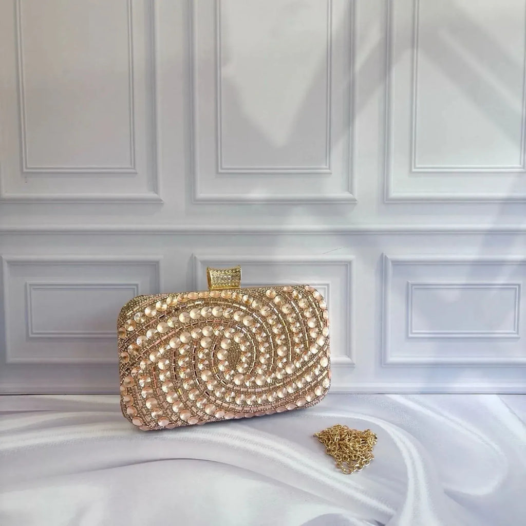 Clutch Cofre Caracol con piedras